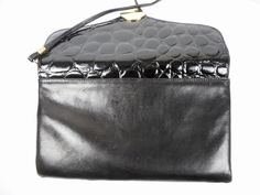 Vintage Bon Gout shoulder bag, black, front with textured skin and golden closure, one compartments and one small with zipper, inner compartment completely leather. Very good condition Dimensions: Width - 29 cm / 11.5'' Height - 18 cm / 7.1'' Strap length - 102 cm / 40.2'' Formal Leather Backed Crossbody Shoulder Bag, Evening Satchel Shoulder Bag With Leather Backing, Formal Leather Satchel Shoulder Bag, Textured Skin, Chunky Chain Necklaces, Gold Statement Necklace, Burberry London, Handbag Black, Shoulder Bag Black