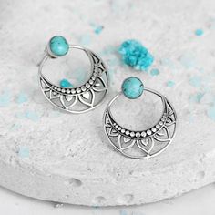 Unique boho earrings with awesome Turquoise stone Made of solid sterling silver **Each stone is unique, the buyer will get a random beautiful Turquoise from the current collection.** Metal: Solid sterling silver Size: 25x22mm Gemstone: Turquoise Gemstone Color: Turquoise Gemstone size: 4x4mm ✈ Free Shipping (USPS) 🎁 Free Gift Box ↻ 60 Days Return ⌛ 24 Handling Time ** GET 15% OFF COUPON ** Visit 👉 boho-magic.com/join Join and get coupons, exclusive offers, updates, and more surprises! ** ALSO Bohemian Silver Earrings With Natural Stones, Bohemian Sterling Silver Gemstone Earrings, Turquoise Sterling Silver Earrings For Festival, Front Back Earrings, Moonstone Ring Sterling Silver, Ear Jacket Earring, Turquoise Boho, Ear Jacket, Earrings Bohemian