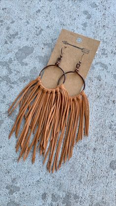 Brown Tassel Earrings For Festivals, Bohemian Brown Fringe Earrings, Brown Fringe Tassel Earrings For Festivals, Brown Dangle Earrings With Tassels, Brown Fringe Dangle Jewelry, Brown Fringe Tassel Dangle Earrings, Brown Fringe Dangle Tassel Earrings, Brown Dangle Tassel Earrings With Fringe, Brown Fringe Jewelry For Festivals