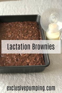 a pan filled with brownies next to a bottle of milk