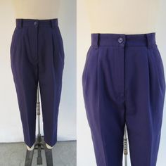 90s high waist purple pleated trousers.  Side pockets. Slightly elastic waist. Tapered leg. Belt loops. All polyester, wash and wear, easy maintenance. They have a short inseam for a petite fit or a cropped look. Made in El Salvador for COUNTERPARTS PETITES Label size 10 petite, they run a bit small, as compared to "modern" sizes and fit like an S/M Measured flat, they have a little give in the waist Please compare measurements to a similar garment that fits you well 26 to 28" partially elasticized waist  13-3/4" rise 40" hips 25-1/2" inseam Good + vintage condition with minimal signs of use and age Purple Relaxed Fit High Waist Bottoms, Fitted Purple Tapered Leg Bottoms, Purple Work Pants With Belt Loops, Fitted Purple Bottoms With Belt Loops, Purple Workwear Pants With Belt Loops, Fitted Purple Tapered Leg Pants, Fitted Retro Purple Bottoms, Retro Fitted Purple Bottoms, Retro High Waist Purple Bottoms