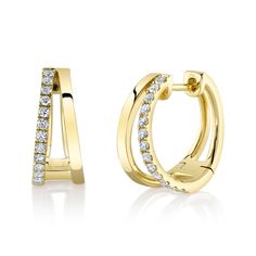 From Shy Creation, these beautiful huggie hoop earrings will add a dazzling measure of glamour to any ensemble. Comprised of gleaming 14k yellow gold, each earring exhibits twinkling round diamonds descending one row of the split hoop. The diamonds total 1/4ctw and are H in color and SI in clarity. Each earring measures 0.65 inch in diameter. The metal weight is 4.1 grams. Fine Jewelry Yellow Gold Hoop Earrings Channel Set, Yellow Gold Hoop Diamond Earrings With Brilliant Cut, Yellow Gold Brilliant Cut Hoop Diamond Earrings, Fine Jewelry Yellow Gold Brilliant Cut Hoop Earrings, Formal Huggie Earrings With Halo Design, Yellow Gold Hoop Diamond Earrings Channel Set, Yellow Gold Diamond Hoop Earrings Channel Set, Formal Halo Huggie Earrings, Yellow Gold Brilliant Cut Hoop Earrings