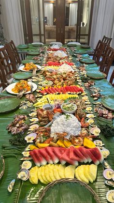 a long table covered in lots of food