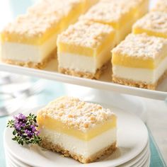 several pieces of cake sitting on plates next to each other