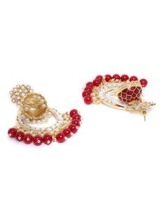 These beautiful maroon (deep red) dome shaped jhumka earrings come with kundan stone studs & beads, are gold-plated and are secured with a post and back closure. These handcrafted jhumkas can be paired with any traditional outfit to add a punch of colorful boost, and help you stand out. Product color may vary based on the monitor or screen you are using.See FAQ for more details. Size Length: 9.5 cm Details Material: BrassStones: Kundan & Artificial BeadsPlating: Gold-plated Festive Chandbali Kundan Necklace With Dangling Beads, Bollywood Ruby Jhumkas For Festivals, Ruby Bollywood Jhumkas For Festivals, Temple Jewelry Style Ruby Chandbalis With Latkans, Red Stone Work Temple Jewelry Jhumkas, Bollywood Ruby Jhumkas With Latkans, Bollywood Style Ruby Jhumkas With Latkans, Ruby Temple Jewelry Jhumkas For Festive Occasions, Red Temple Jewelry Jhumkas For Celebration