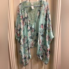 Floral Cover Up, New With Tags, One Size Fits All, Can Be Tied In The Front Turquoise Floral Print Top For Spring, Floral Print Vacation Tops One Size, One Size Floral Print Summer Tops, Blue One Size V-neck Top, Blue V-neck Top One Size, Blue V-neck Top, One Size Floral Print Tops For Spring, One Size Floral Print V-neck Top, Spring Blue Tops One Size