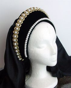 "This headpiece is a perfect compliment to any dress. It is believed that Henry VIII's second wife and Elizabeth I's mother, Anne Boleyn brought the Hood style of headwear back to England following her service at the court of the French King. This traditional example of an elaborate French Hood circa 1520 - 1540 and has been made from a sturdy base that has been covered with lush velvet. Appropriate weight wire has been added to maintain it's shape. The gold metallic trim has been adorned with h Second Wife, Medieval Costume, Anne Boleyn