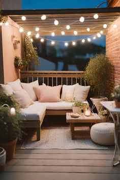 an outdoor living room with lights strung above the couch