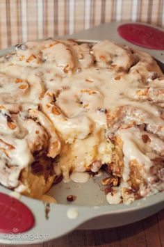 a close up of a cake in a pan on a table