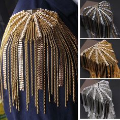 the back of a woman's dress with gold chains and fringes on it