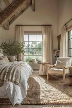 a bedroom with a bed, chair and window in the room that is made out of natural materials