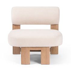 a white chair sitting on top of a wooden frame