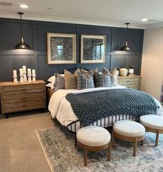 a large bed sitting in a bedroom on top of a rug