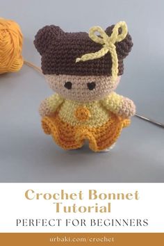 a crochet doll is sitting next to a ball of yarn with the words, crochet bonnett tutor perfect for beginners