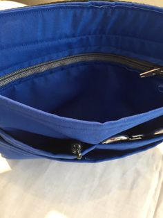 "This belted Scrub Pocket is super lightweight, and will accommodate tools, instruments, phone, notepad, keys, money, credit cards, etc. Dimensions are 8\" X 8\" with three layers of pockets for storing your personal or professional items. Belt and buckle are included. Machine wash, dry flat. Thanks for stopping by!" Functional Blue Organizers For Everyday Use, Blue Zipper Pouch Organizers For Everyday Use, Blue Bags With Zipper Pocket For Personal Use, Blue Zipper Closure Organizers For Everyday Use, Blue Functional Organizer, Functional Blue Organizers, Nurse Pocket Organizer, Functional Travel Belt Bag With Anti-theft Pocket, Functional Belt Bag With Anti-theft Pocket For Travel