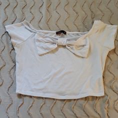 Adorable Little Stretchy Crop Top With Bow At The Neckline. Never Worn, But I've Owned It Forever. Size Small White Tops With Bow For Day Out, Casual White Tops With Bow, White Bow Tops For Day Out, Trendy White Top With Bow, White Bow Top For Day Out, Cute White Top With Bow, Fitted Bow Crop Top For Summer, White Bow Crop Top For Summer, Fitted White Crop Top With Bow