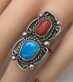 Beautiful Sterling silver Old Pawn Native Native Turquoise and red Coral Ring in good condition and photos are part of the description ring size 8.25 Southwestern Style Red Turquoise Ring, Vintage Silver Turquoise Ring For Collectors, Vintage Silver Turquoise Ring Collectible, Southwestern Red Multi-stone Ring, Southwestern Multi-stone Red Ring, Red Southwestern Multi-stone Rings, Vintage Sterling Silver Hallmarked Turquoise Ring, One-of-a-kind Silver Turquoise Ring In Sterling Silver, Unique Nickel-free Sterling Silver Turquoise Ring