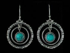 "Turquoise Hoop Earrings handcrafted in Sterling Silver with natural Tibetan Turquoise gemstones, dangling from Balinese-inspired textured hoops, representing the moon's orbit around the earth. * Handcrafted in the finest .925 Sterling Silver. * From the Karma Collection, inspired by the celestial sun, moon & earth. * 2- 6mm Tibetan Turquoise gemstones from India, to bring happiness, good luck, & spiritual grounding. * Each natural gemstone is unique and may vary slightly and the amount Spiritual Grounding, Sterling Silver Turquoise Earrings, Silver Turquoise Earrings, Celestial Sun, Turquoise Hoop Earrings, Silver Turquoise Jewelry, Turquoise Hoops, Earth 2, Turquoise Drop Earrings