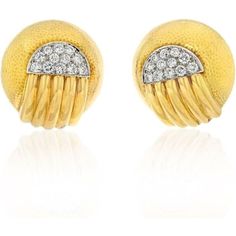 Behold the exquisite craftsmanship and undeniable allure of these David Webb Platinum & 18K Yellow Gold Diamond Dome Round Clip On Earrings. These captivating pieces are meticulously crafted with a blend of 18K yellow gold and platinum, showcasing a harmonious fusion of elegance and durability. The brilliance of the round cut diamonds accentuates the beauty of these earrings, reflecting light with every graceful movement.What sets these earrings apart is the signature David Webb hammered finish, Graceful Movement, Reflecting Light, David Webb, Diamond Birthstone, Diamond Design, Gold Platinum, Round Cut Diamond, Estate Jewelry, Clip On