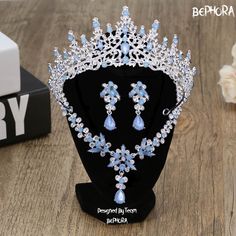 Material:Rhinestone, Crystal 👑Surface length of 15 cm and a crown Opal  height of 6.5 cm - Necklace 45 CM Black Friday & Christmas, End of the year Final sale 🎁  (Limited Stock!) 🍓PROMO 1: Buy ANY Headpiece get a $22 Nail set For FREE  🍓PROMO 2: Buy total over $99 GET a $50 Crown For FREE  🎊 (Random Surprise Present Pack - Handpicked Mystery Items, Ideal for Gift-Giving, Delightful Surprise with Every Order) 👑Luxury bridal Crown encrusted with crystals, this royal wedding headpiece is perf Light Blue Quinceanera Jewelry, Quince Crowns Blue, Quinceanera Crowns Light Blue, Light Blue Crown, Crown With Blue Jewels, Opal Jewelry Set, Quinceanera Crown, Crown Baby, Blue Crown