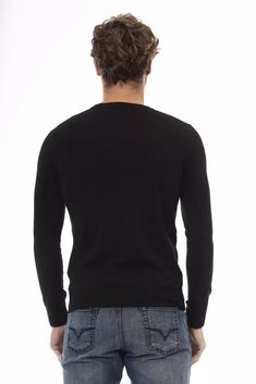 Elevate your style with the Baldinini Trend Crew Neck Sweater, where comfort meets luxury in a seamlessly crafted design. Exude sophistication with long sleeves, a delicate ribbed knit at the neck, cuffs, and bottom, all tailored for a regular fit that speaks to the modern man. The standout feature – a Baldinini Trend monogram in metal – injects a dose of brand prestige. Perfect for a refined yet trendsetting wardrobe essential. Material: 95% Wool, 5% Elastane Country of Origin: MD Color: Black Sophisticated Wardrobe, Knitwear Collection, Armani Jeans, Blazer Outfits, Guess Jeans, Premium Brands, Wool Blend Sweater, Seychelles, Sweater Sleeves