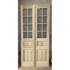 two wooden doors sitting next to each other