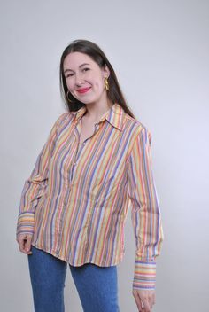 Vintage striped multicolour blouse with long sleeve, Size L Welcome to TARASCOMMON.ETSY.COM Unique clothing from the 20th century.   Model tall - 170cm   L. 44 - size on the tag.   Sleeve - 45cm / 17.71inch; ( armpit to end of sleeve); Width - 50cm / 19.68inch; Length - 65cm / 25.59inch.    All measurements are taken seam to seam while lying flat.   This item is vintage, so it can have some defects. Additional photos can be send   We are glad that you are interested in lots that we sell. Wish yo Multicolour Blouse, High Collar Shirts, Unique Clothing, Vintage Kimono, The 20th Century, Unique Outfits, Print Blouse, Red Blouses, Kimono Fashion