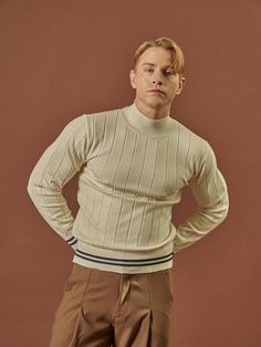 Composition : 50% wool, 50% acrylic spandexCountry of Origin : China Beige Ribbed Cuff Turtleneck Sweater, Beige Turtleneck Sweater With Ribbed Cuffs, Beige Merino Wool Sweater With Ribbed Collar, Beige Merino Wool Sweater With Ribbed Cuffs, Beige Wool Polo Sweater With Ribbed Collar, Cream Polo Sweater With Ribbed Collar For Winter, Classic Beige Sweater With Ribbed Collar, Beige Ribbed Merino Wool Sweater, Beige Wool Tops For Winter