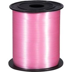 a spool of pink ribbon on a white background