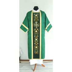 the priest's robe is green and gold