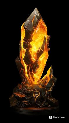 a sculpture made out of rocks and fire on top of a black surface with the light shining