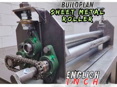 an image of a machine that is working on some metal parts and has the words, buildplan sheet metal roller english