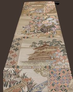 Free shipping Vintage Japanese Obi (Kimono sash), 100%silk,  KINKAKU(-JI) depicted in Calm Color  Embroidery 0503-0082 On this Obi, the colors are subdued and calm, which is appropriate to depict a famous pavilion  ( Kinkaku) of a Japanese temple (Rokuon-ji).   The atmosphere of this Obi is very calm though it has a lot of gold. KINKAKU is clearly depicted by embroidery so that the pavilion looks like a beautiful Japanese painting.   Please appreciate Japanese elegance and chicness having this obi in your hands. We offer a set of a hanger and a pair of weights for Obi hanging decoration for a set price.  Please see below for ** Set of Obi Decoration Hunger and Weights, and item No.03-0100 for photos of the set.        Fukuro-Obi (One side pattern) Rokutsu- Gara ( Main pattern on approximat Japanese Elegance, Obi One, Obi Kimono, Obi Sash, Belt Kimono, Japanese Obi, Japanese Colors, Japanese Temple, Color Embroidery