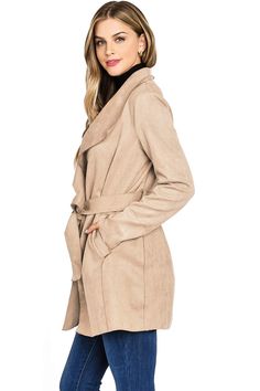 Faux-suede wrap coat with a mid thigh length, trench coat silhouette. Minimal, classic design with oversized draping lapels, slant pockets on the sides and a self-tie belt at the waist. Light weight coat effortlessly layers without looking bulking. CARE | Hand Wash Cold CONTENTS | Shell: 96% Polyester/ 4% Spandex/ Lining: 100% Polyester MEASUREMENTS | 33"/84 cm Top to Bottom MODEL | 5'8 - wearing a size S/M IMPORTED Spring Shawl Collar Belted Outerwear, Chic Beige Wrap Outerwear, Fall Beige Outerwear With Tie Waist, Chic Outerwear With Tie Waist And Lapel Collar, Fall Belted Wrap Outerwear, Fall Outerwear With Tie Waist And Lapel Collar, Fall Wrap-style Belted Outerwear, Belted Wrap Outerwear For Fall, Chic Belted Pea Coat With Lapel Collar