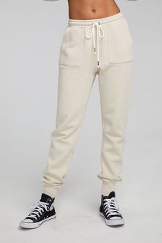 Rock the streets and stay chic with our Tessa Oatmeal Jogger! Crafted from 100% cotton, it boasts front pockets and a drawstring waist for effortless styling. Its versatile oatmeal beige color will keep you on-trend all year long—so make sure to keep it at the center of your wardrobe! Model is 5'9" and wearing size small Fabric Content: 100% Cotton Imported Style: CW9838-OTML