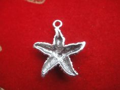 This sterling silver starfish charm measures almost 20x15mm. Perfect for the necklaces, bracelets, and earrings. It is oxidized to show details.1 pc.SHINY VERMEIL VERSIOIN:  Listing: https://www.etsy.com/listing/130272859/vermeil18k-gold-over-925-sterling-silverFor the larger quantity convo us.Thanks for stopping by! Sterling Silver Star-shaped Charms, Silver Star Sterling Silver Charms, Silver Star-shaped Sterling Silver Charms, Silver Sterling Silver Star Charms, Silver Starfish Charm For Gifts, Silver Starfish Charm Pendant Jewelry, Silver Starfish Charm As Gift, Silver Starfish Charm For Gift, Silver Starfish Charm Jewelry