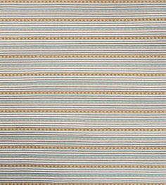 a blue and yellow striped rug with small dots on it