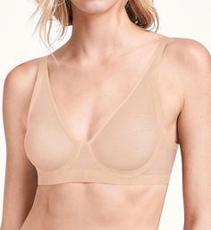 Thoroughly modern and sexy bra with supportive fabrics for comfortable wear. Made of polyamide and elastane. Molded cups are sheer, minimal stretch mesh that is lined with same fabric for reduced show-through and added support. Deep apex neckline has a bonded, stretch velvet-flocked edge. Center - slightly arched center panel. Underside of front features a wide band of flocked stretch velvet. Sides and back are self-lined sheer mesh with stretch velvet edges bonded at top and bottom. Center pull Sheer Full Coverage Stretch Bra, Mesh Full Coverage Bra With Removable Pads, Modern Fitted Seamless Bra, Modern Seamless Fitted Bra, Modern Seamless Bra, Seamless Full Coverage Mesh Bra, Sheer Full Cup Bra, Elegant Sheer Low-cut Bra, Elegant Low-cut Sheer Bra