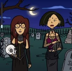 two women standing next to each other in a graveyard