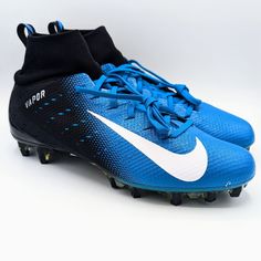 a pair of blue and black nike vapor soccer cleats on a white background