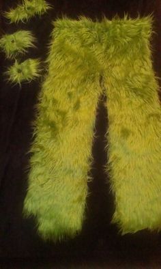 a pair of neon green furry pants on display