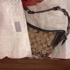 Coach Handbag. Brand New And Unused In Original Coach Gift Box, With Wrapping Tissue Paper. Khaki Chocolate In Color. Original Tags Still Attached. Coach Designer Bag As Gift, Coach Brown Bag As Gift, Coach Brown Bag For Gift, Coach Brown Bag As A Gift, Chic Coach Shoulder Bag Gift, Chic Coach Shoulder Bag For Gift, Chic Coach Shoulder Bag As Gift, Wrapping Tissue Paper, Coach Gift