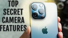 someone holding an iphone with the top secret camera features