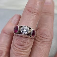 Ring Size 6 Sterling Silver Synthetic Ruby Cubic Zirconia Handmade Jewelry Gift My Dad Hand Made This Unique Piece. Perfect For An Engagement Ring. Comes In A Beautiful Pouch. Beautiful Boho Hippie Festival One Of A Kind Cool Coachella Birthday Gift 90s 80s 70s 60s Resort Bohemian Retro Travel Casual Spring Summer Fall Vacation Johnny Was Gypsy Spell Vici Arnhem Love Lemons Mumu Anthropology Anthro Madewell Free People Faithful Wildfox Zara Reformation Revolve Contemporary Fashion Style Wild Fox Red Jewelry With Brilliant Cut Round Stone, Elegant Silver Ruby Three Stone Ring, Elegant Silver Ruby Ring With Three Stones, White Gold Ruby Three Stone Jewelry, Three Stone Round Lab-created Ruby Jewelry, Three Stone Lab-created Ruby Jewelry, Red Sterling Silver Jewelry With Brilliant Cut, Silver Three-stone Ruby Ring, Silver Ruby Ring With Three Stones