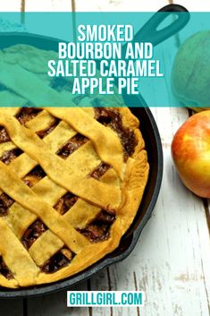 an apple pie in a cast iron skillet with the words smoked bourbon and salted caramel apple pie