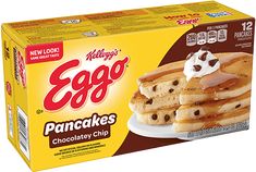 eggo pancakes with chocolate chips on a plate in a cardboard box, ready to be eaten