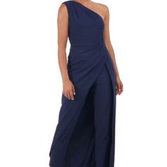 This Jumpsuit Represents An Understated Elegance That’s Effortless To Style. Designed With Luxurious Stretch Crepe, It Features A One Shoulder Pleated Bodice, And An Asymmetric Low Silhouette. Side Zipper One Shoulder Skinny Leg Stretch Crepe 88% Polyester, 12% Spandex The Manuf Tag Is Missing...The Dept Store Tag Is Attached Fitted Blue Floor-length Jumpsuits And Rompers, Blue Fitted Floor-length Jumpsuits And Rompers, Blue Fitted Floor-length Jumpsuit, Blue Full-length Evening Pants, Blue Full Length Evening Pants, Evening Blue Full Length Pants, Navy Fitted Elegant Jumpsuits And Rompers, Elegant Fitted Navy Jumpsuits And Rompers, Blue Fitted Full-length Jumpsuits And Rompers