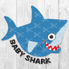 a baby shark cutout with the word baby shark on it's chest and teeth