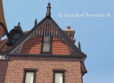 an old brick building with a weather vein on the roof and window above it is labeled victorian roof decoration ii