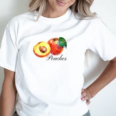 Peach Trendy Crewneck Cottagecore Shirt Graphic Tees For Women Fruit tshirt Comfort Colors Gift for Foodie Trending Fruit Shirt Please message us if you want your t-shirt in one of the additional colors or a sweatshirt.  Comfort Colors garment-dyed t-shirt made 100% with ring-spun cotton. The soft-washed, garment-dyed fabric brings extra coziness to your wardrobe while the relaxed fit makes it an excellent daily choice.  Please keep in mind that the design is scaled down for smaller t-shirt sizes. T-SHIRT CARE INSTRUCTIONS: Machine wash cold Wash inside-out, with similar colors Tumble dry low. Hang-dry for longer life Cool iron inside-out. Do not use bleach Do not iron directly on the print Do not dry-clean Thank you for supporting our small business! Please visit our shop https://www.etsy Fruit Baby, Fruit Shirt, Minimalist Shirt, Trendy Crewneck, Peach Shirt, Cottagecore Shirt, Minimalist Shirts, Cute Gifts For Her, Peach Fruit